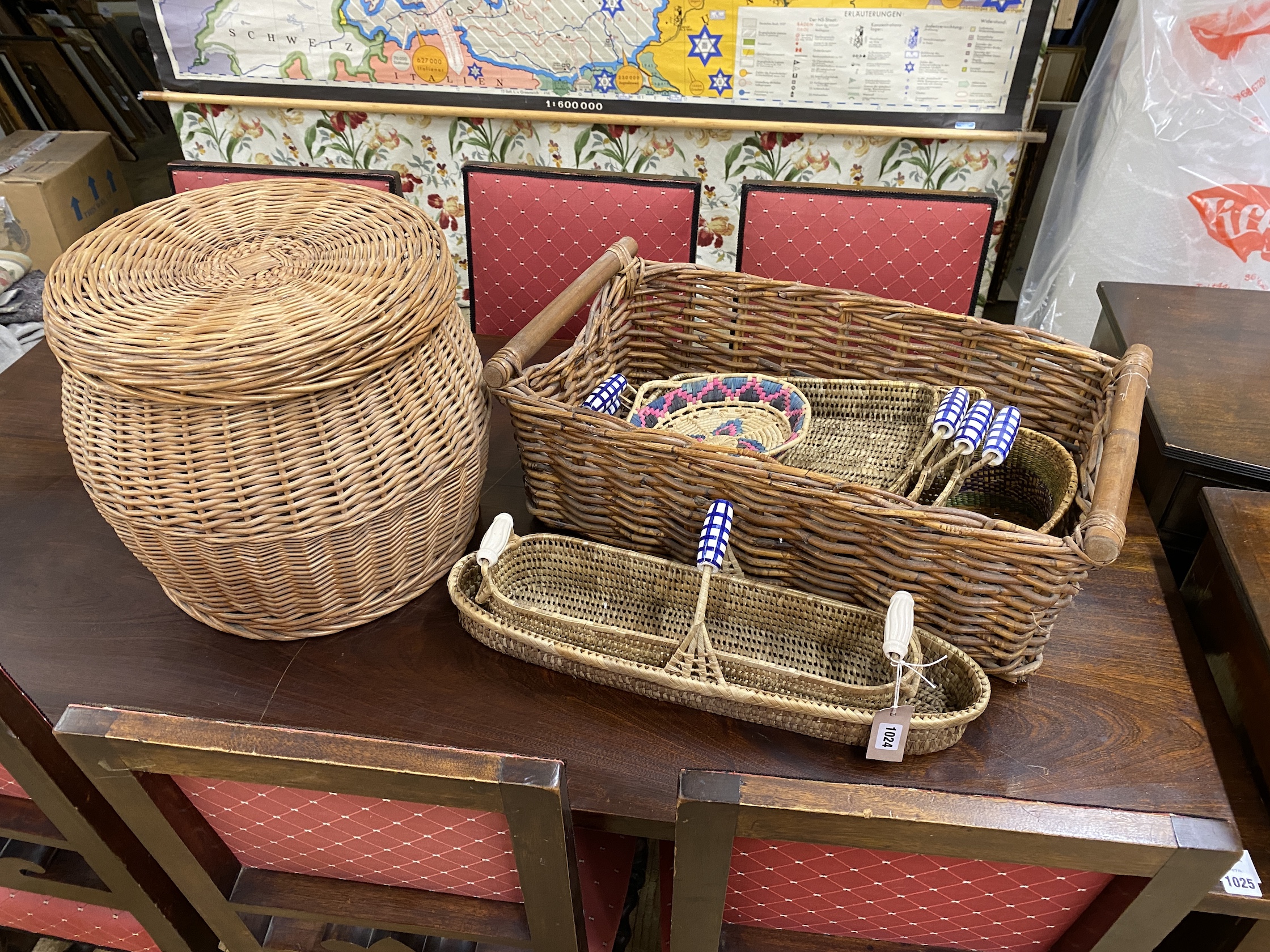 Ten assorted wicker baskets and trays, largest width 67cm, height 25cm